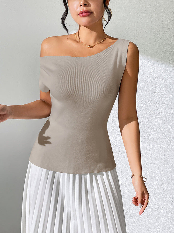 Mirla | Enfärgad ärmlös topp med off-shoulder stickad design-Eva Jonsson