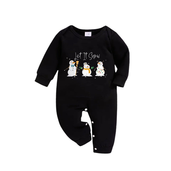 Mirla | Julfamiljepyjamas I Matchande Stil - Svart Topp och Grön Rutig Byxset med Snögubbe och Let It Snow Tryck-Eva Jonsson