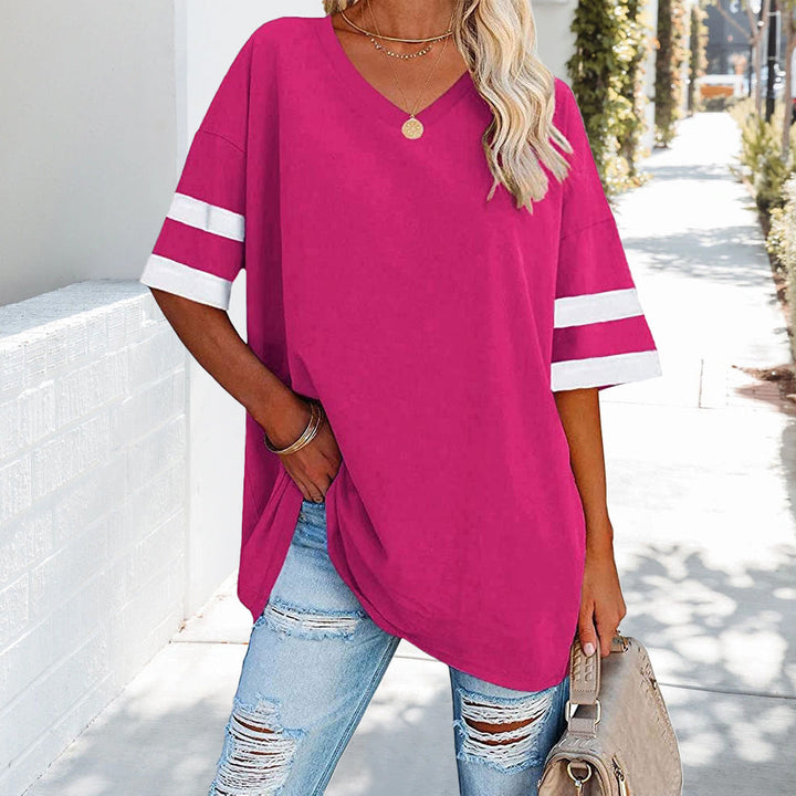 Mirla | Kontrastfärgade, Lösa Dam T-shirt med V-hals-Eva Jonsson