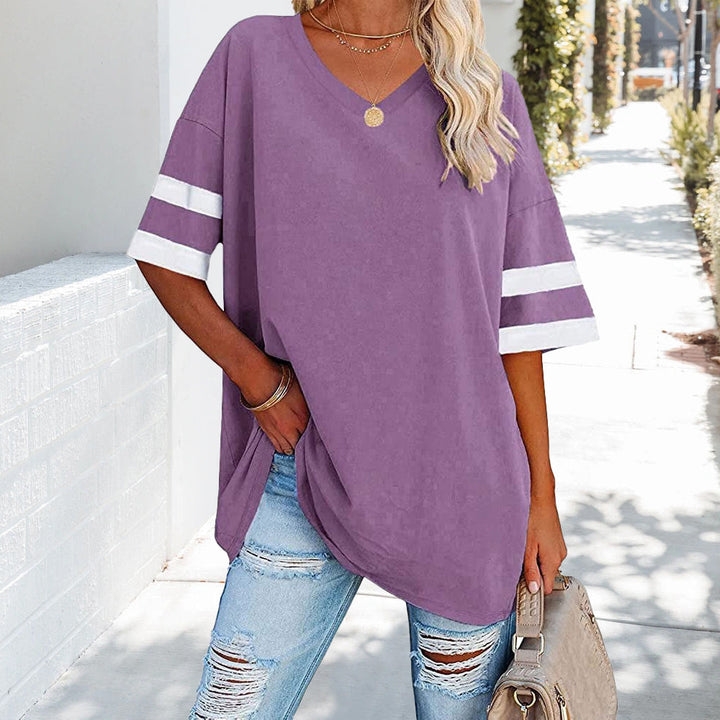 Mirla | Kontrastfärgade, Lösa Dam T-shirt med V-hals-Eva Jonsson