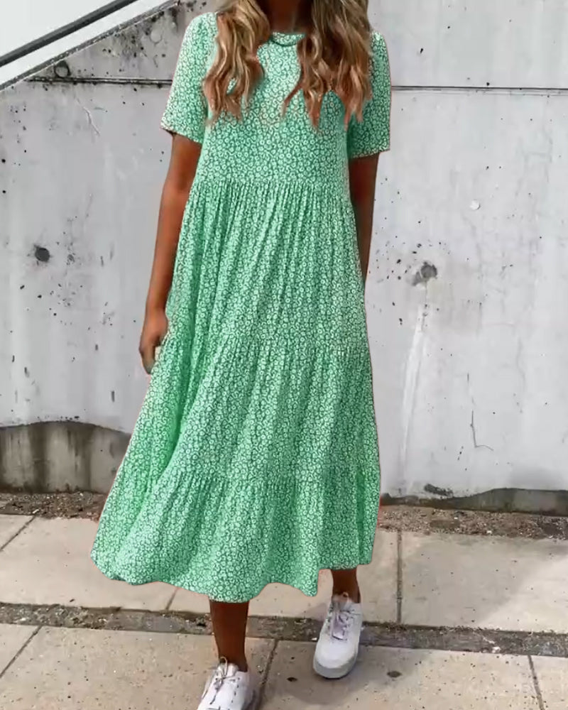 Mirla | Kortärmad klänning med blommönster-Eva Jonsson