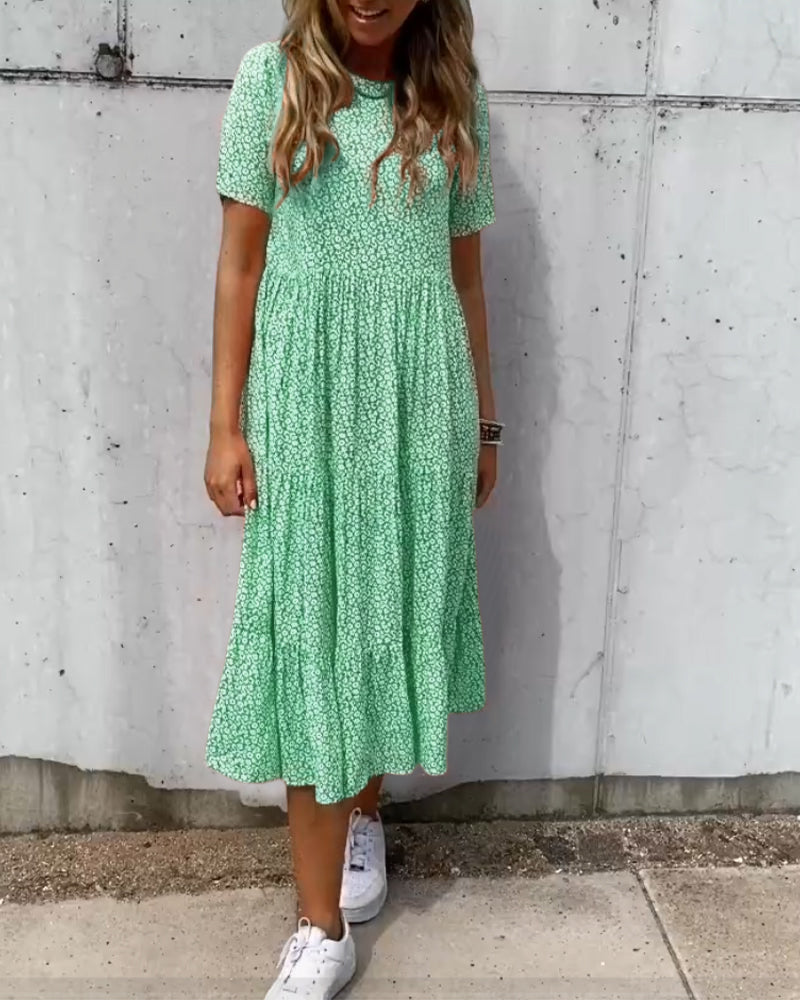 Mirla | Kortärmad klänning med blommönster-Eva Jonsson