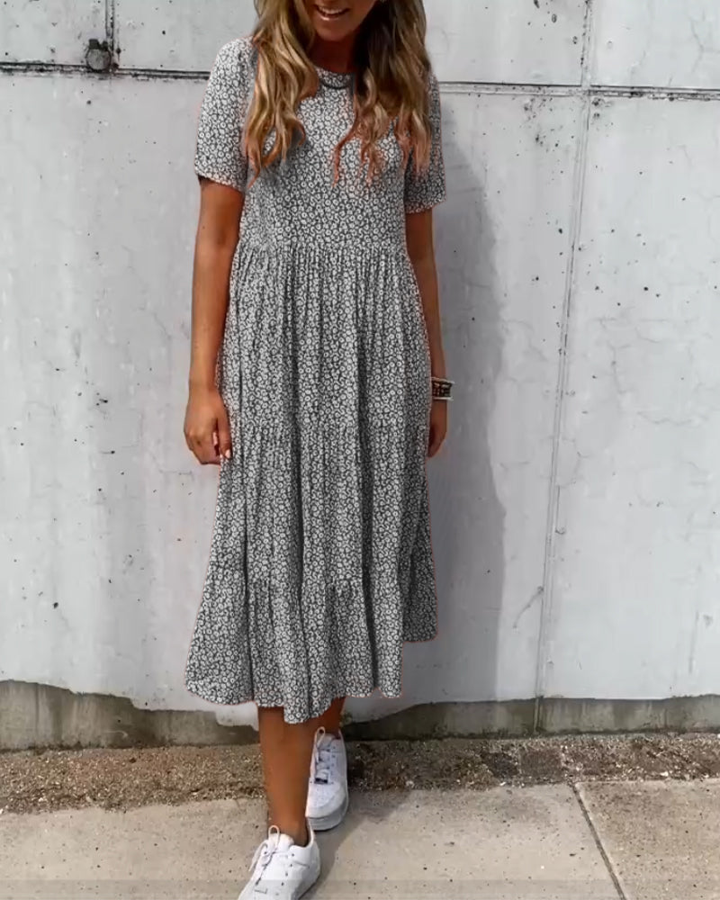 Mirla | Kortärmad klänning med blommönster-Eva Jonsson