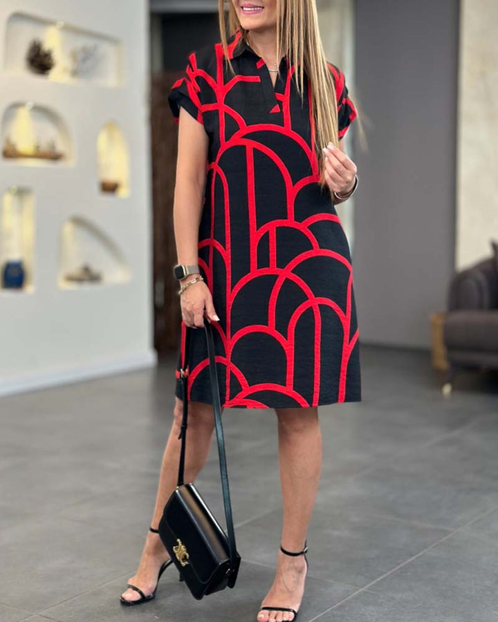 Mirla | Kortsleeve midikjol med reverslinje-tryck-Eva Jonsson