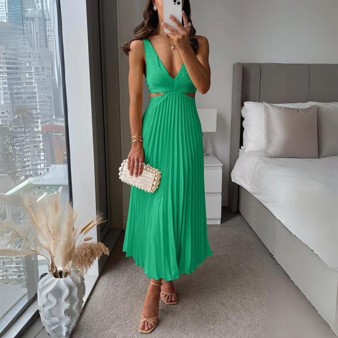 Mirla | Midi klänning ärmlös V-hals twist front & cut out detalj plisserad kjol-Eva Jonsson