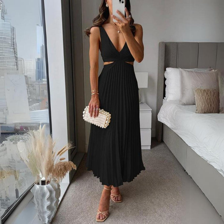 Mirla | Midi klänning ärmlös V-hals twist front & cut out detalj plisserad kjol-Eva Jonsson