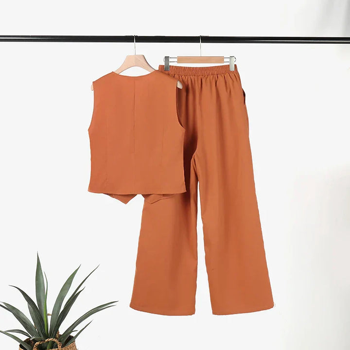 Mirla | Modern Set Elegant Ärmlös V-Hals Topp och Vid Skurna Byxor Damdräkt-Eva Jonsson