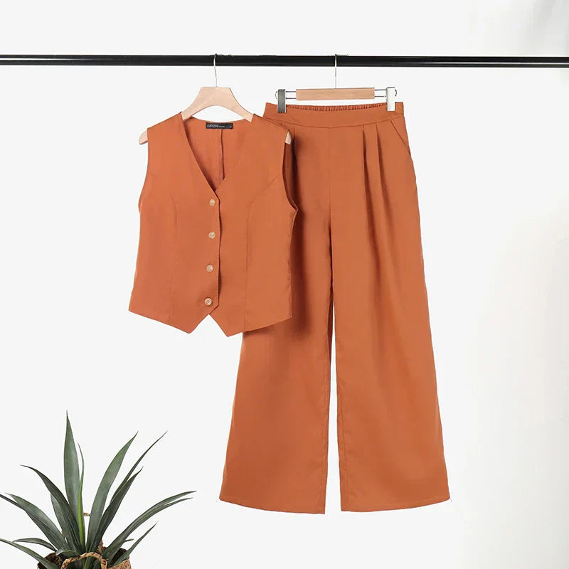Mirla | Modern Set Elegant Ärmlös V-Hals Topp och Vid Skurna Byxor Damdräkt-Eva Jonsson