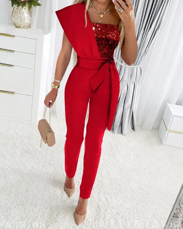 Mirla | One Shoulder Jumpsuit med paljetter och midjeband-Eva Jonsson