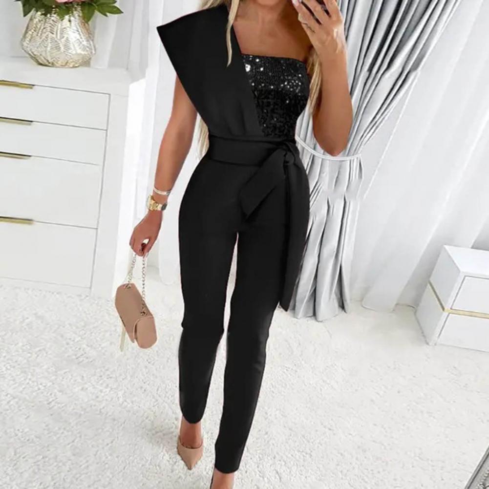 Mirla | One Shoulder Jumpsuit med paljetter och midjeband-Eva Jonsson