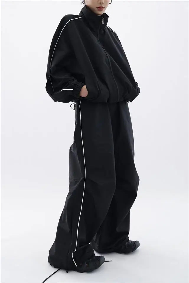 Mirla | Oversized Sportig Svart Träningsdräkt-Eva Jonsson