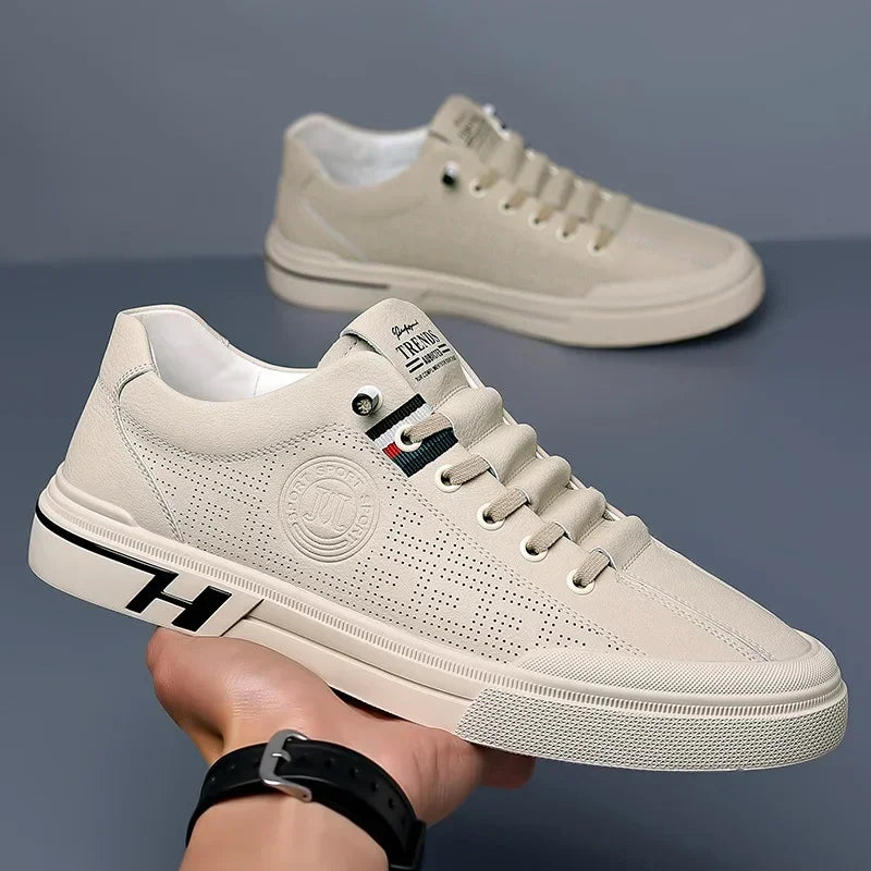 Mirla | Perforerade lädersneakers med logodetalj-Eva Jonsson