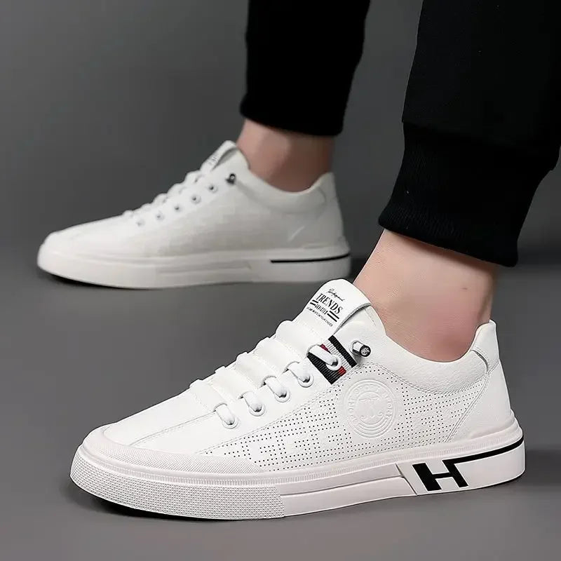 Mirla | Perforerade lädersneakers med logodetalj-Eva Jonsson
