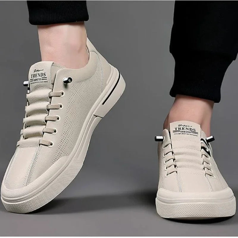 Mirla | Perforerade lädersneakers med logodetalj-Eva Jonsson
