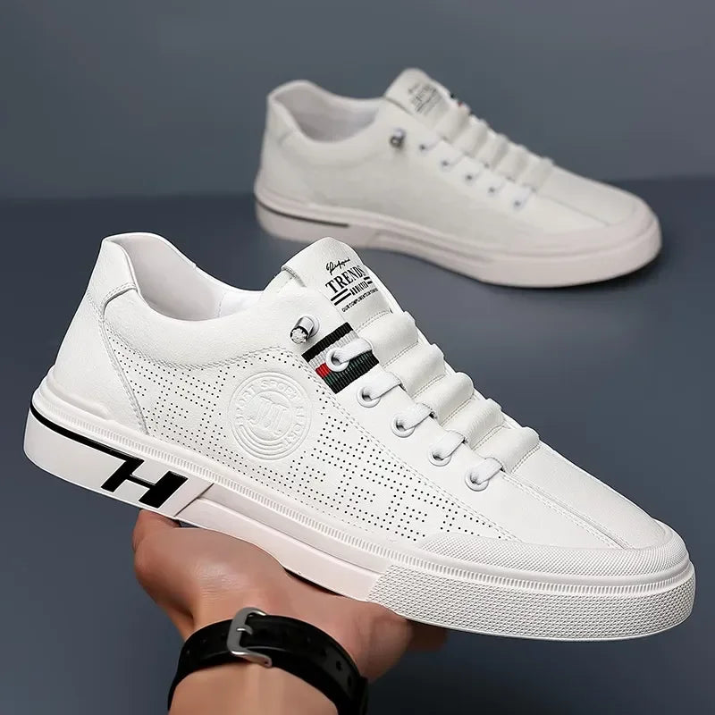 Mirla | Perforerade lädersneakers med logodetalj-Eva Jonsson