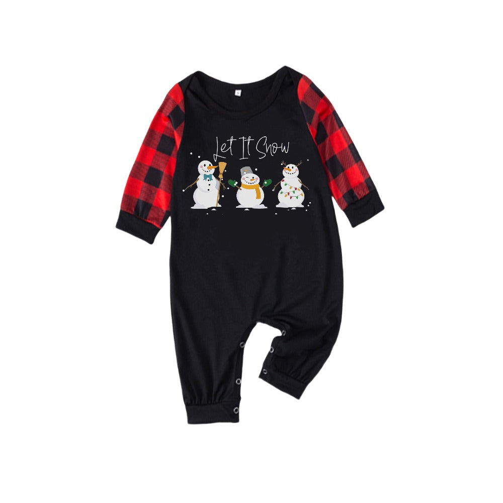 Mirla | Röd och Svart Rutig Julpyjamas-Set med Snögubbe- och Slogan-Designs-Eva Jonsson