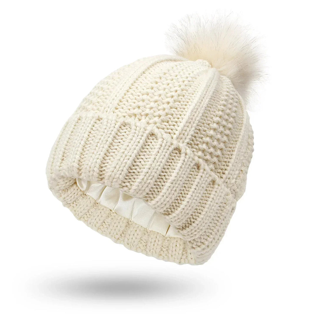 Mirla | Satäng Fodrad Stickad Mössa – Varm och Moderiktig för Vintern-Eva Jonsson
