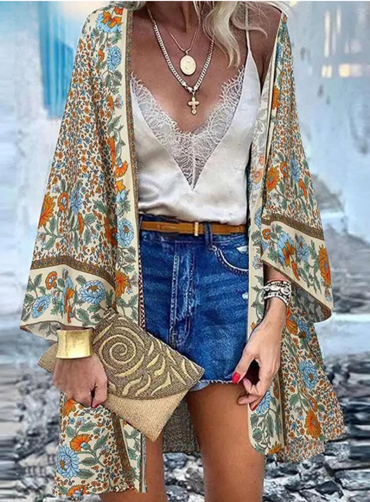 Mirla | Sommarinspirerad damkofta i boho-stil med färgglad blomsterdesign-Eva Jonsson