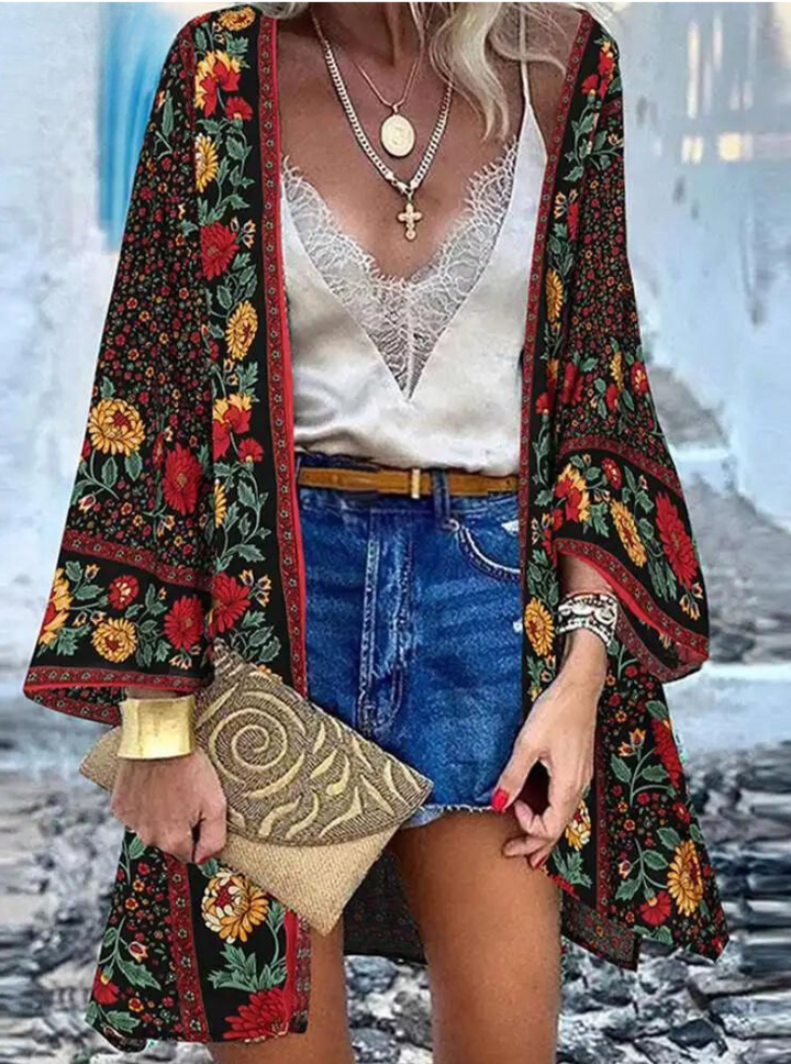 Mirla | Sommarinspirerad damkofta i boho-stil med färgglad blomsterdesign-Eva Jonsson