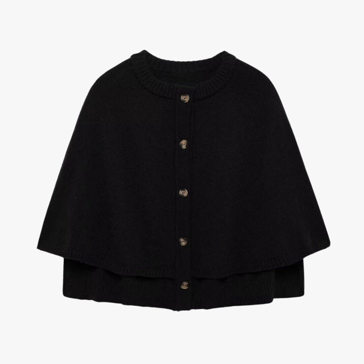 Mirla | Stickad cape med knappar och vågig fåll-Eva Jonsson