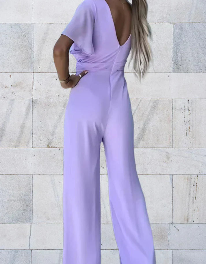 Mirla | Stilig overall med djup V-ringning och korta ärmar för en elegant och mode-medveten look-Eva Jonsson