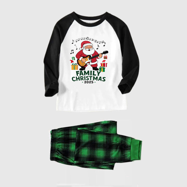 Mirla | Svart Raglan-Topp Grön Rutigt Jul-Pyjamas-Set med God Jul 2025 och Jultomte Tryck-Eva Jonsson
