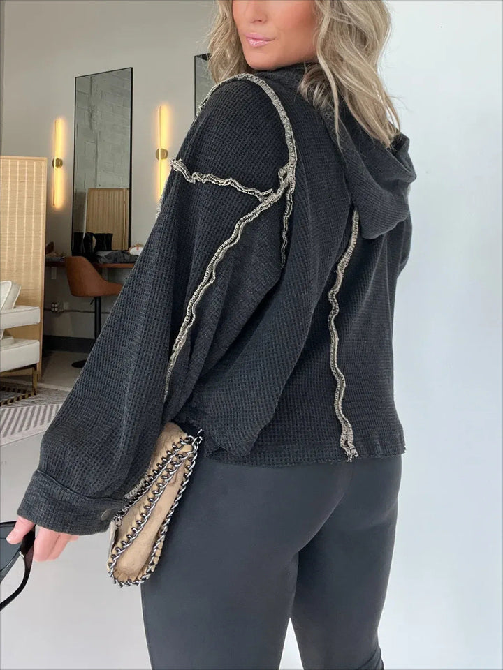 Mirla | Tröja med Ojämn Fåll för Höst och Vinter-Eva Jonsson