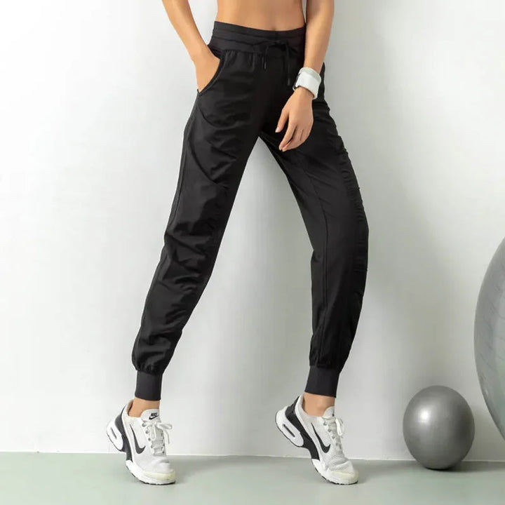 Mirla | Tyg Snörning Länkar Löpning Sport Joggers Kvinnor Snabbt Torkande Athletisk Fitness Tränings Sweatpants med Två Fickor Rörelse Byxor-Eva Jonsson