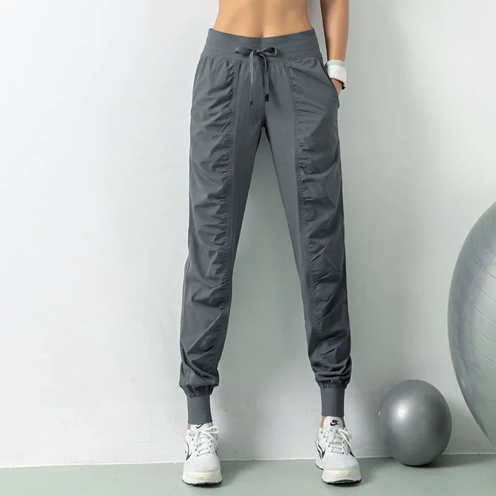 Mirla | Tyg Snörning Länkar Löpning Sport Joggers Kvinnor Snabbt Torkande Athletisk Fitness Tränings Sweatpants med Två Fickor Rörelse Byxor-Eva Jonsson