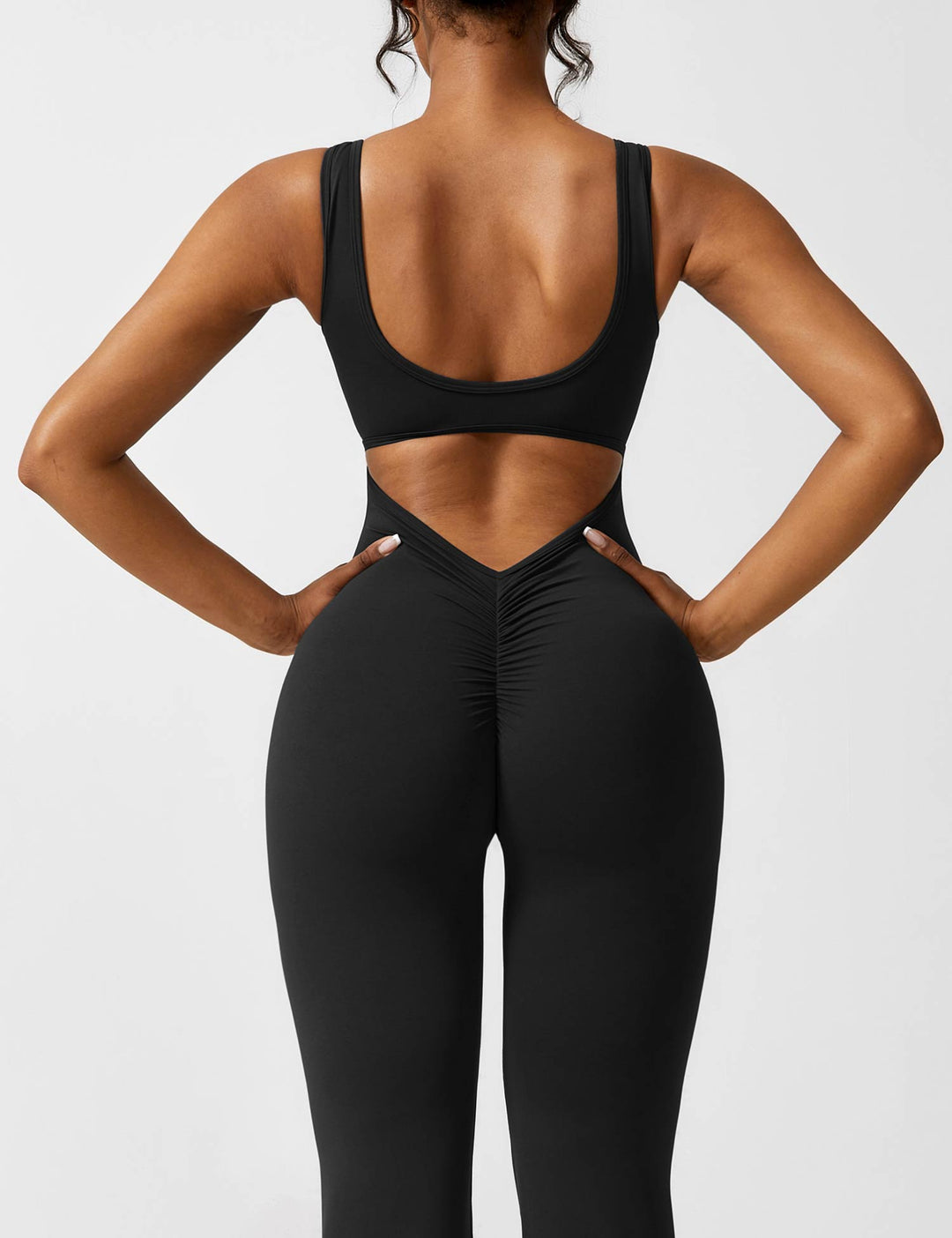 Mirla | V-rygg Utsvängd Jumpsuit-Eva Jonsson
