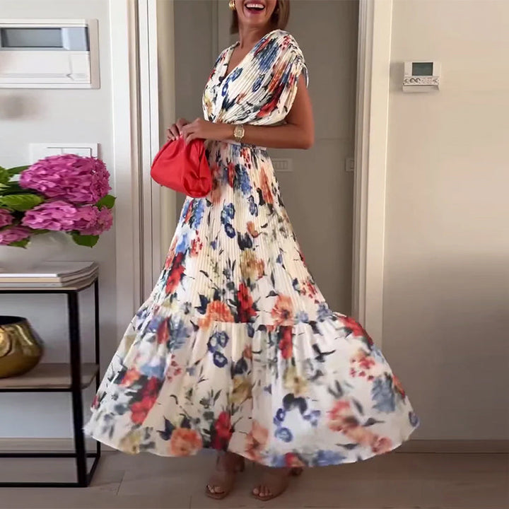 Mirla | Vacker Elegant Fållad Klänning med Blommönster-Eva Jonsson