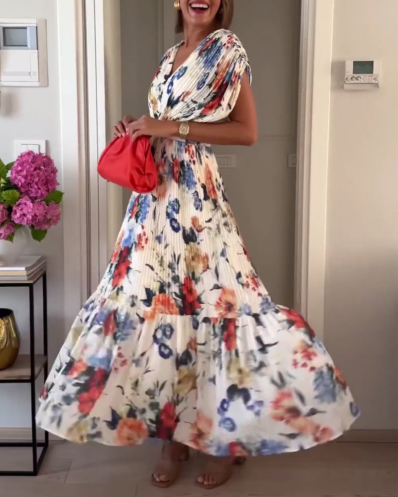 Mirla | Vacker Elegant Fållad Klänning med Blommönster-Eva Jonsson