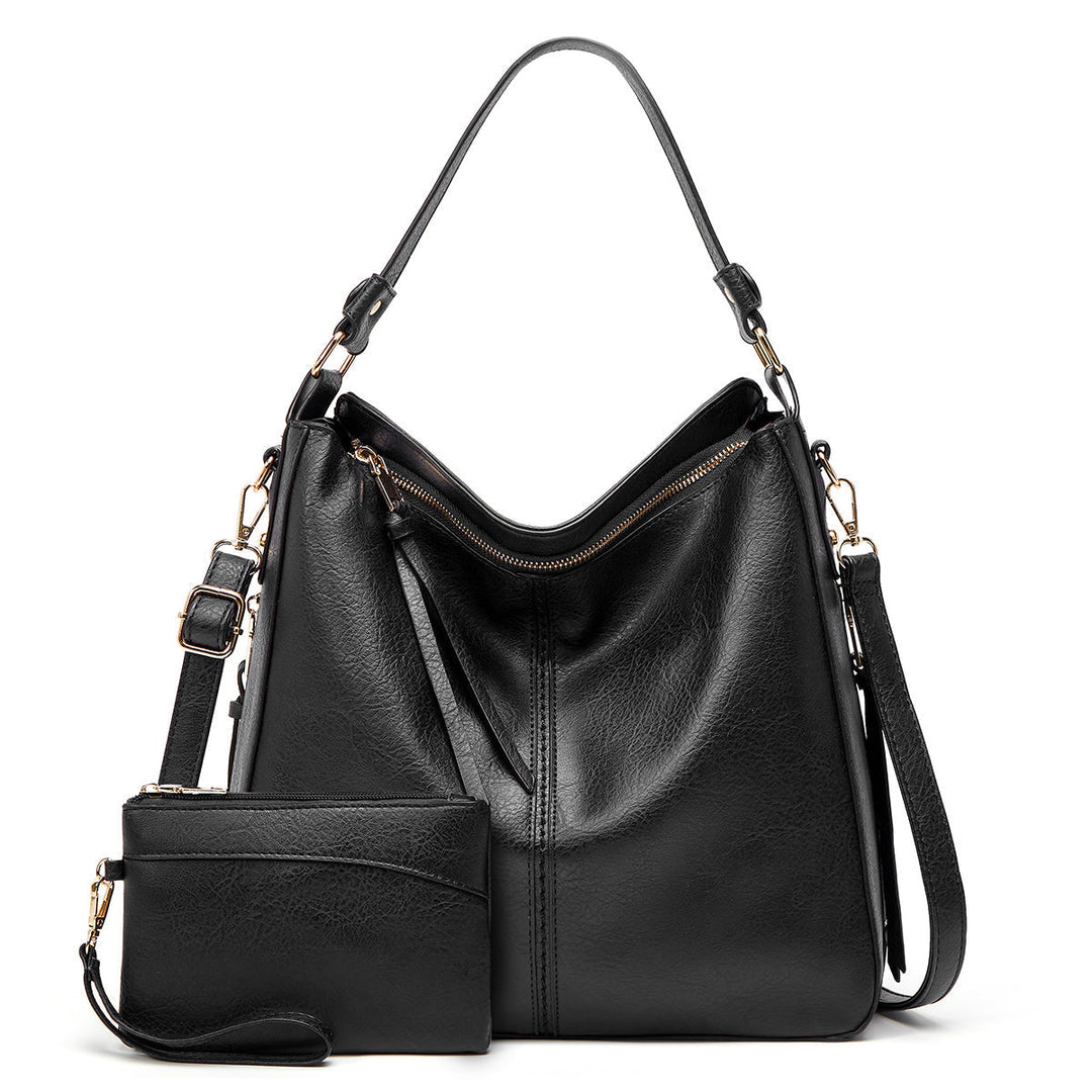 Mirla | Vintage-inspirerad läder hobo-väska-Eva Jonsson