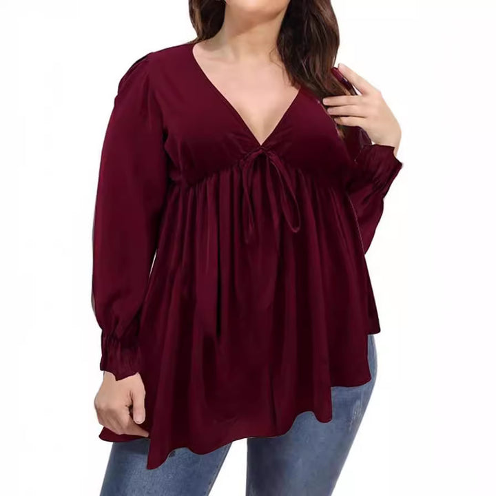 Damer blus med eleganta ruffle-detaljer och modeprint Eva Jonsson