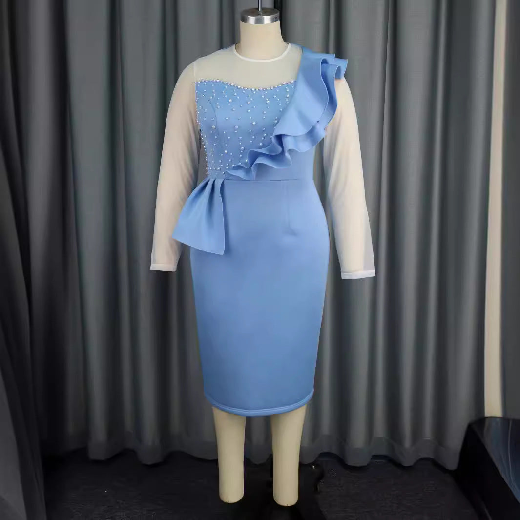 Damer elegant klänning med volanger och pärlapplikationer Mirla-Eva Jonsson
