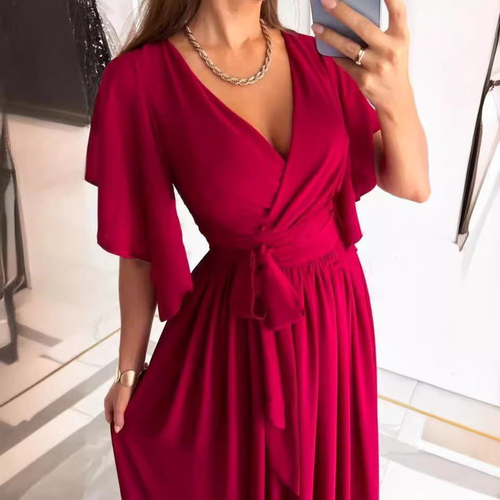 Damer Elegant Maxiklänning med voluminösa ärmar och stiligt benslits Eva Jonsson