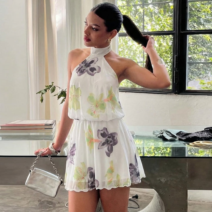 Dams ärmlös blommönstrad klänning Mirla-Eva Jonsson