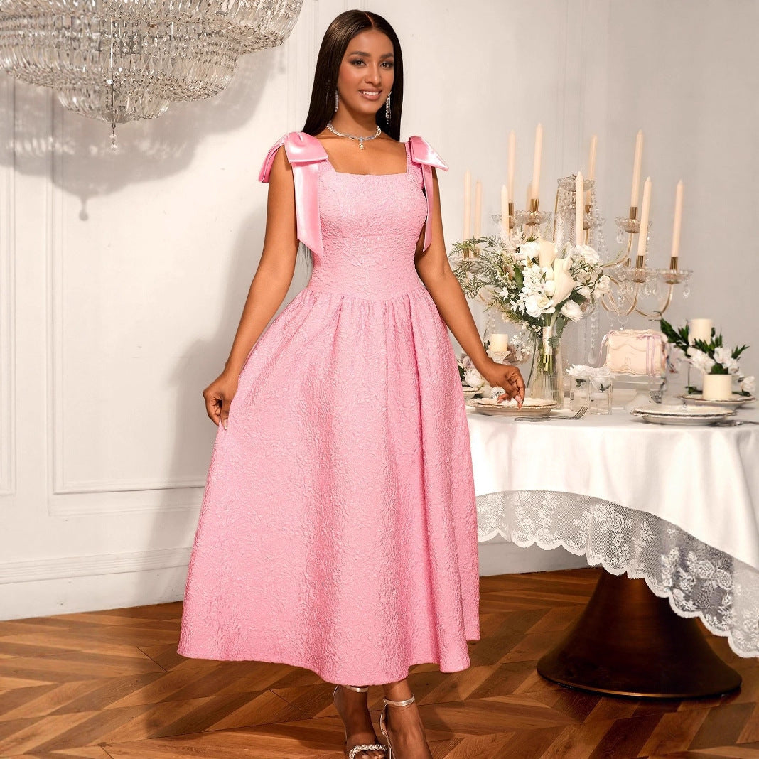 Damer Elegant aftenkjole med brede satinsløjfer Mirla-Eva Jonsson