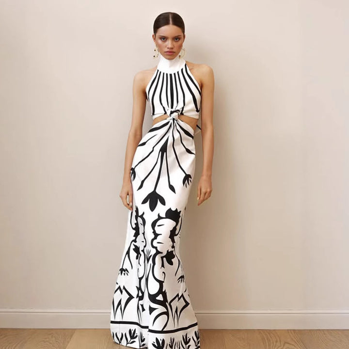 Damer elegant maxiklänning med asymmetrisk skärning och blommigt mönster Eva Jonsson