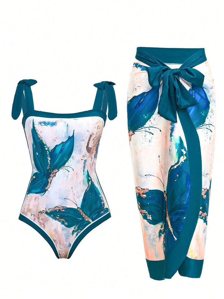 Damen Eleganter Badesuit mit floralen Akzenten und modischem Wickelrock Echo Archiv