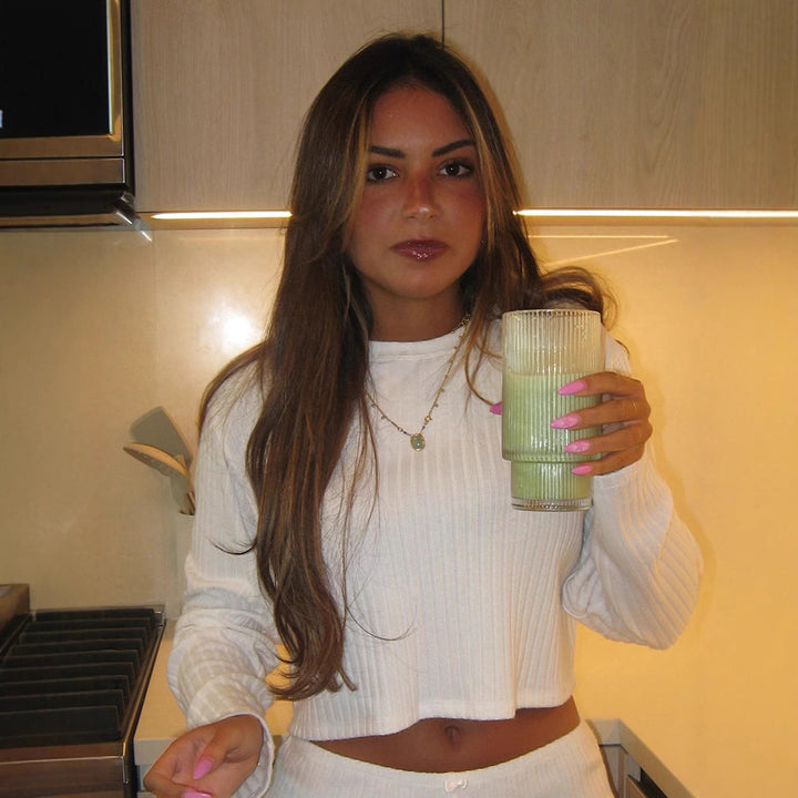Damer avslappnat shortset i mjukt ribbat material med långa ärmar Eva Jonsson