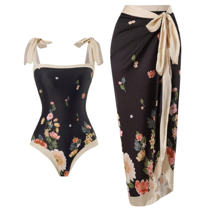 Damen Eleganter Badesuit mit floralen Akzenten und modischem Wickelrock Echo Archiv