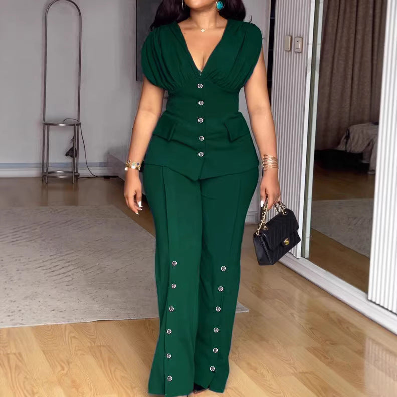 Damer Elegant jumpsuit med draperad överdel och dekorativa knappar Mirla-Eva Jonsson