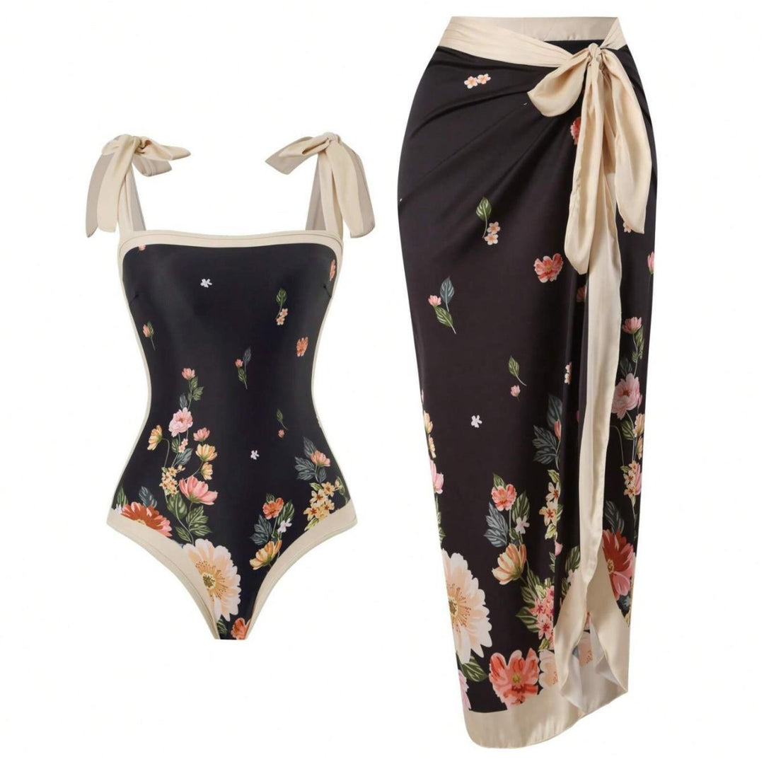 Damen Eleganter Badesuit mit floralen Akzenten und modischem Wickelrock Echo Archiv