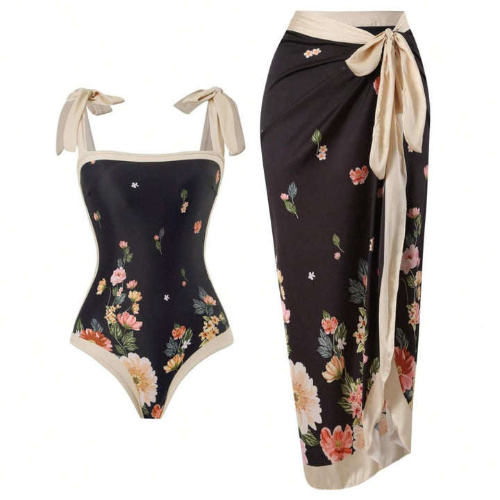 Damen Eleganter Badesuit mit floralen Akzenten und modischem Wickelrock Echo Archiv