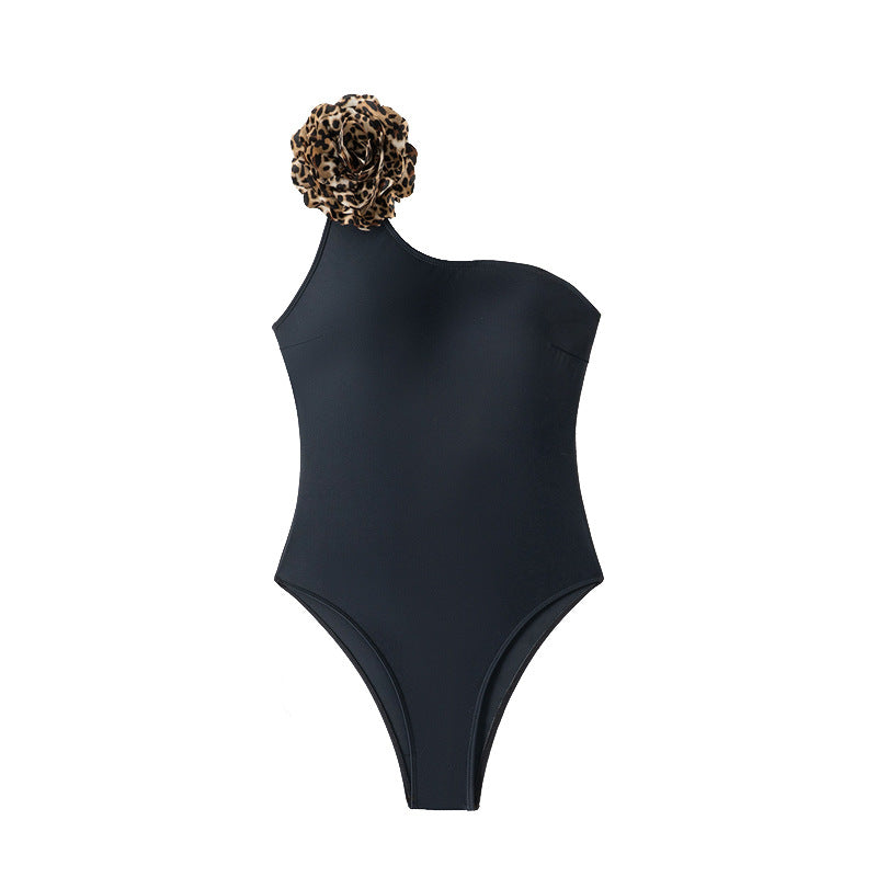 Damen Einseitiger Badeanzug mit elegantem Tiermuster und floralem Akzent Echo Archiv