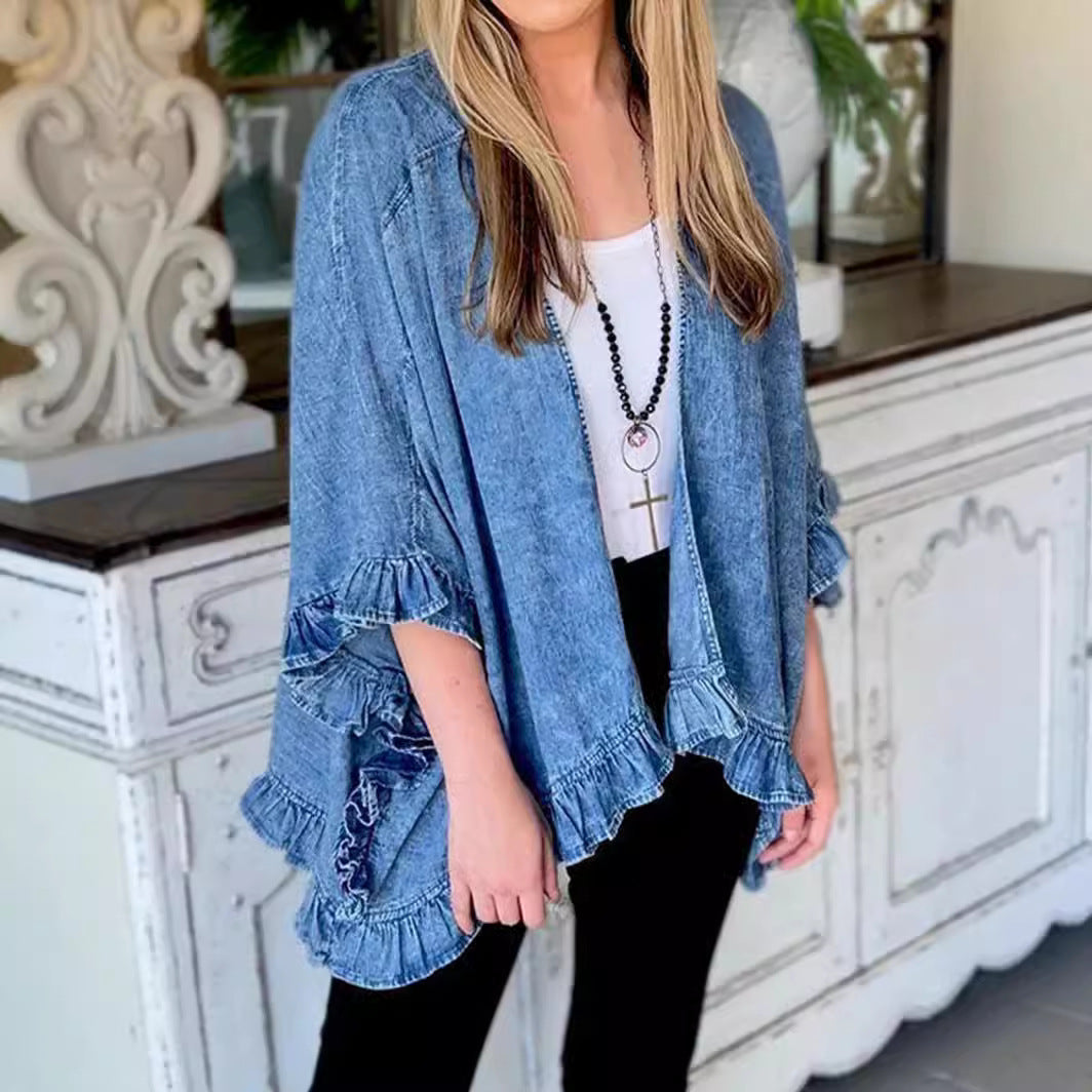 Damer avslappnad jeans-cape med voluminösa volangdetaljer Eva Jonsson