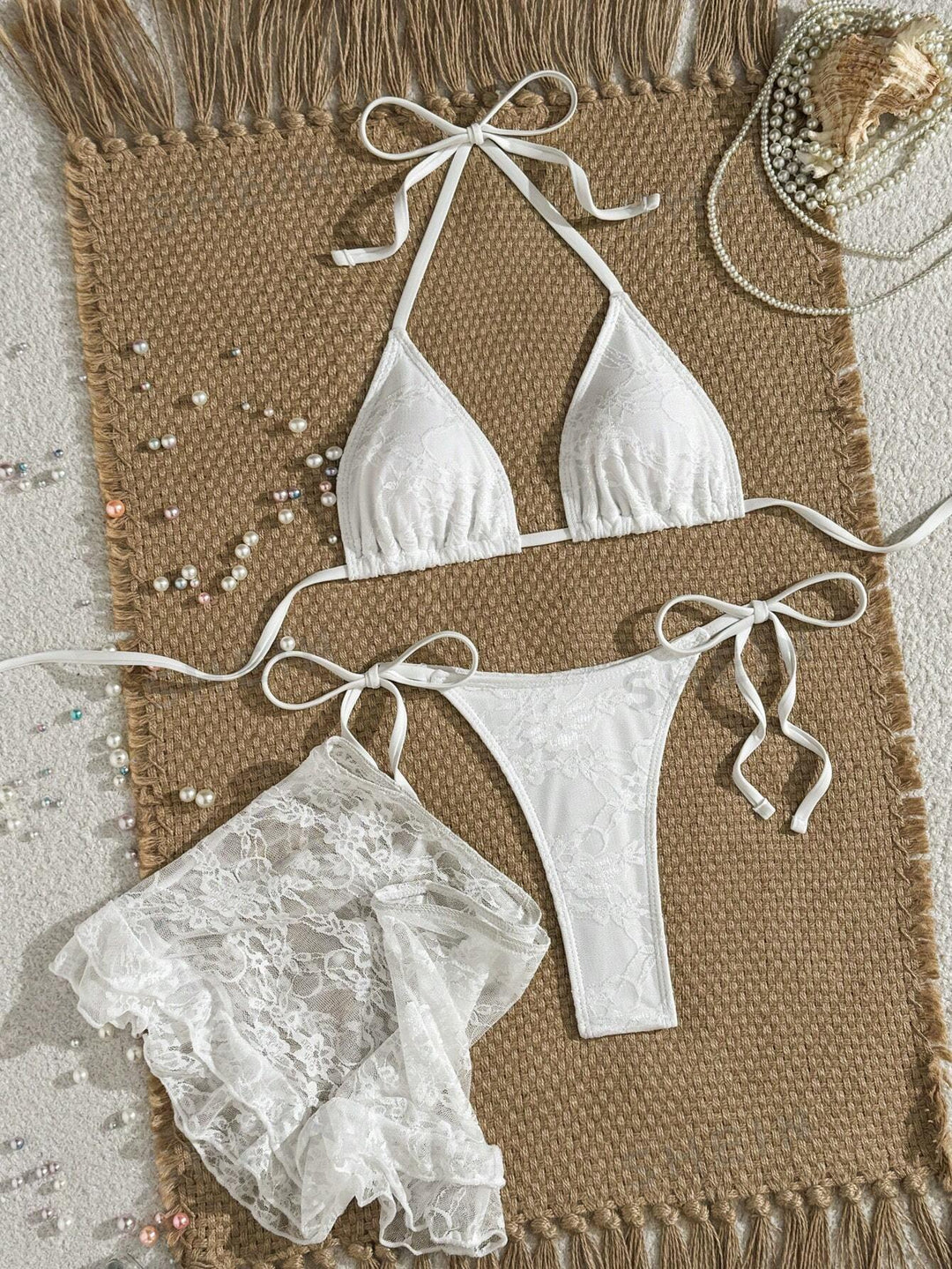 Damen Spitzen-Bikini mit floralem Design und fließendem Rock Echo Archiv