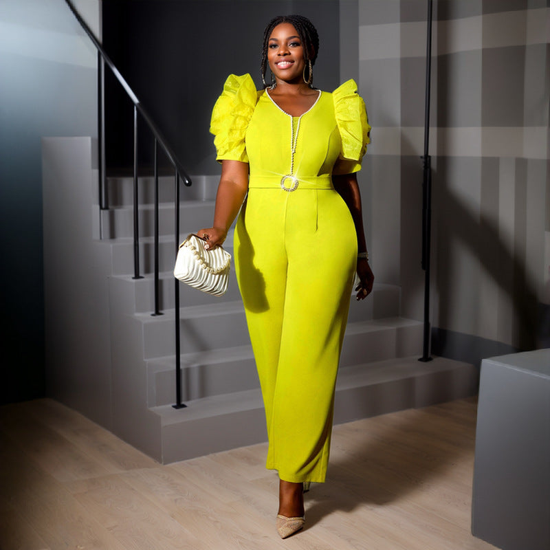 Damer elegant jumpsuit med voluminösa puffärmar och pärlaccent Mirla-Eva Jonsson