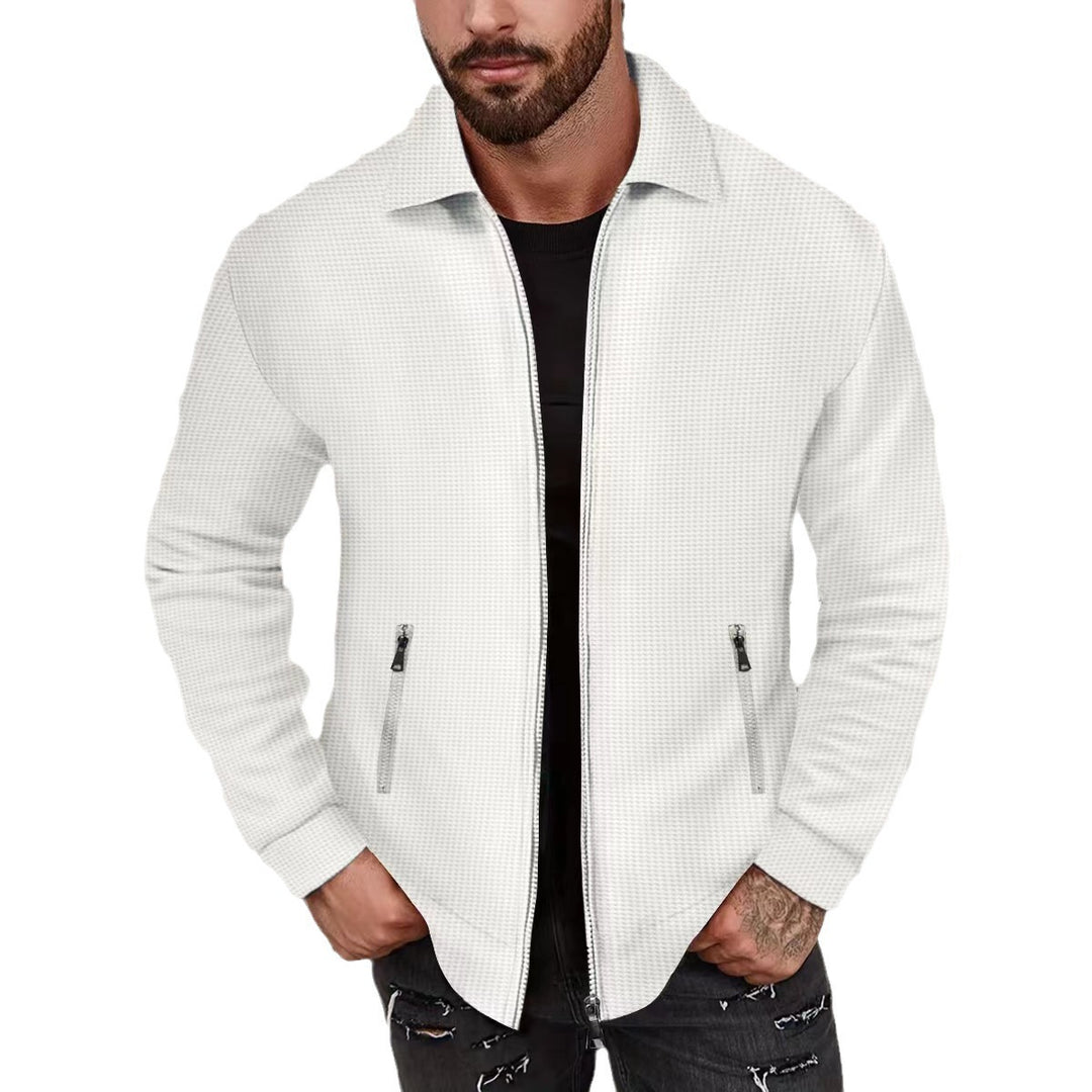 Herrens avslappnade zip-jacka med strukturerad design och praktiska fickor Eva Jonsson